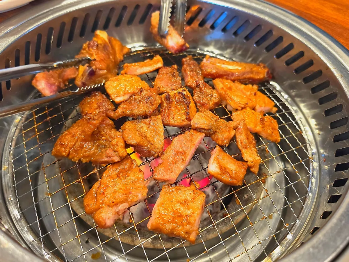 Seasoned pork galbi plated mostly meat with barely any sauce