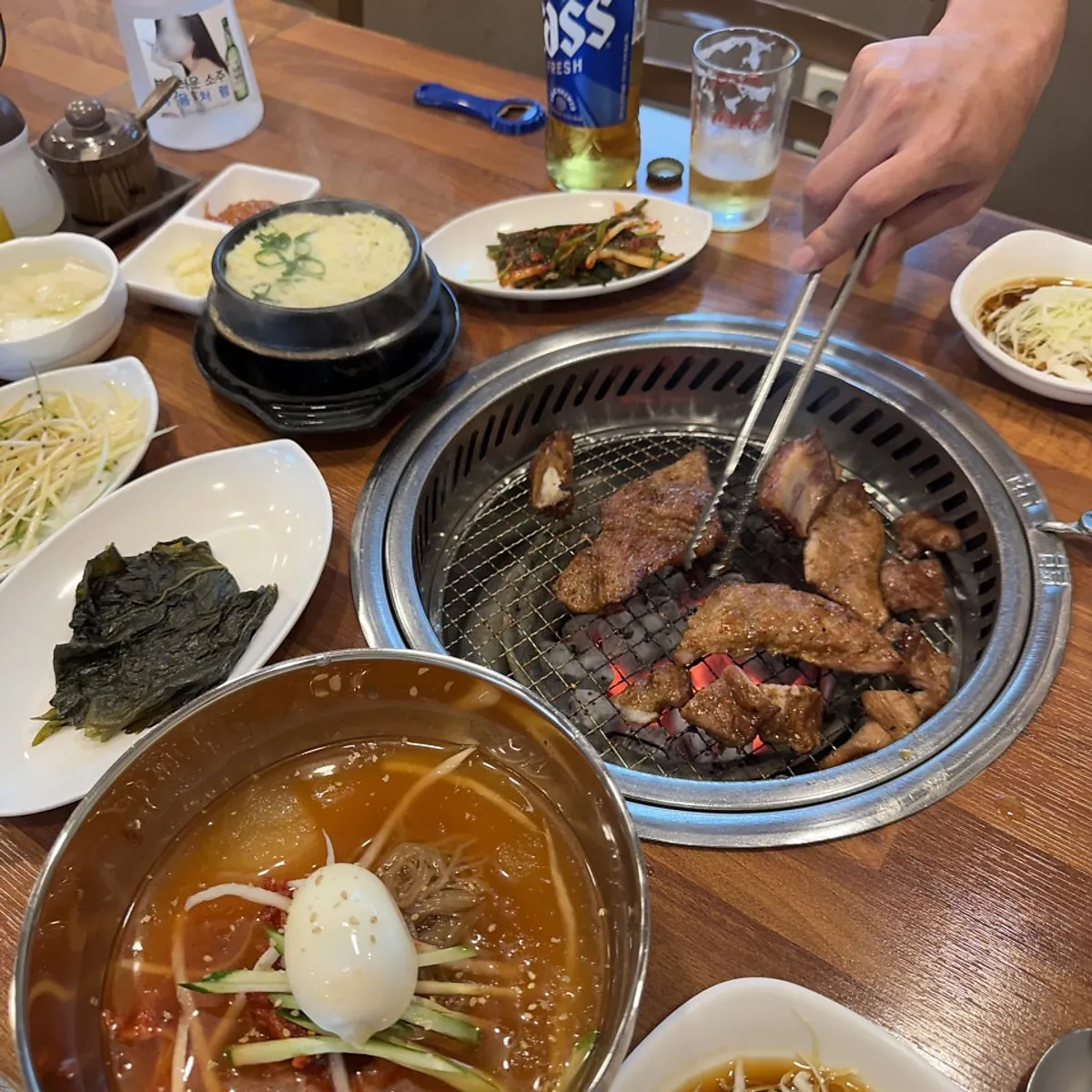 Hoe-naengmyeon topped with garnish for dessert