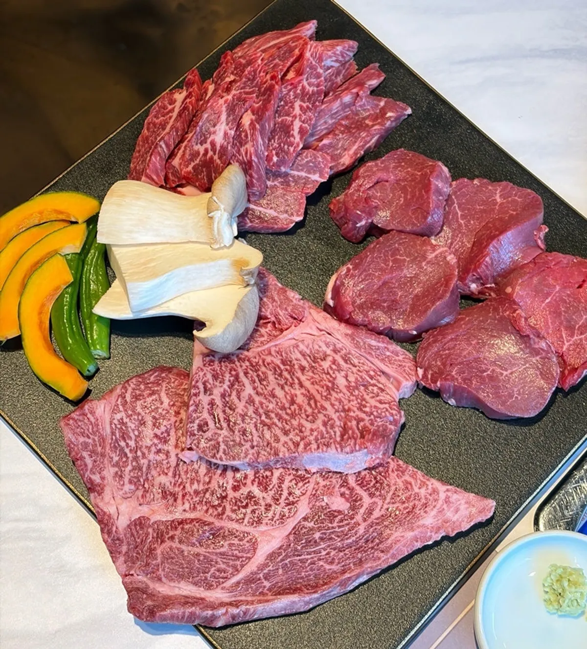 Hanwoo tenderloin, sirloin, and skirt served on one plate