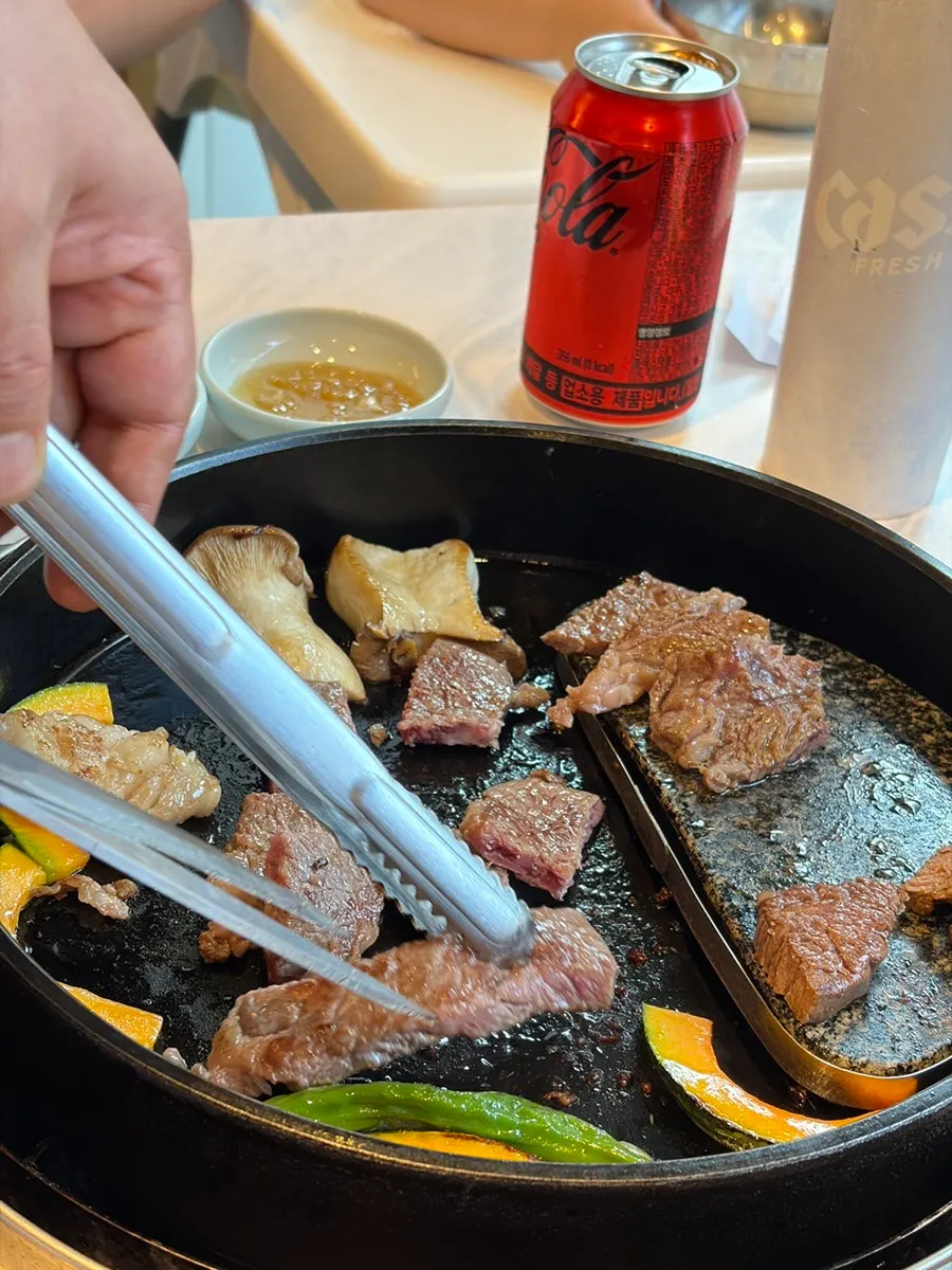 Hanwoo sirloin cut into a bite-sized piece