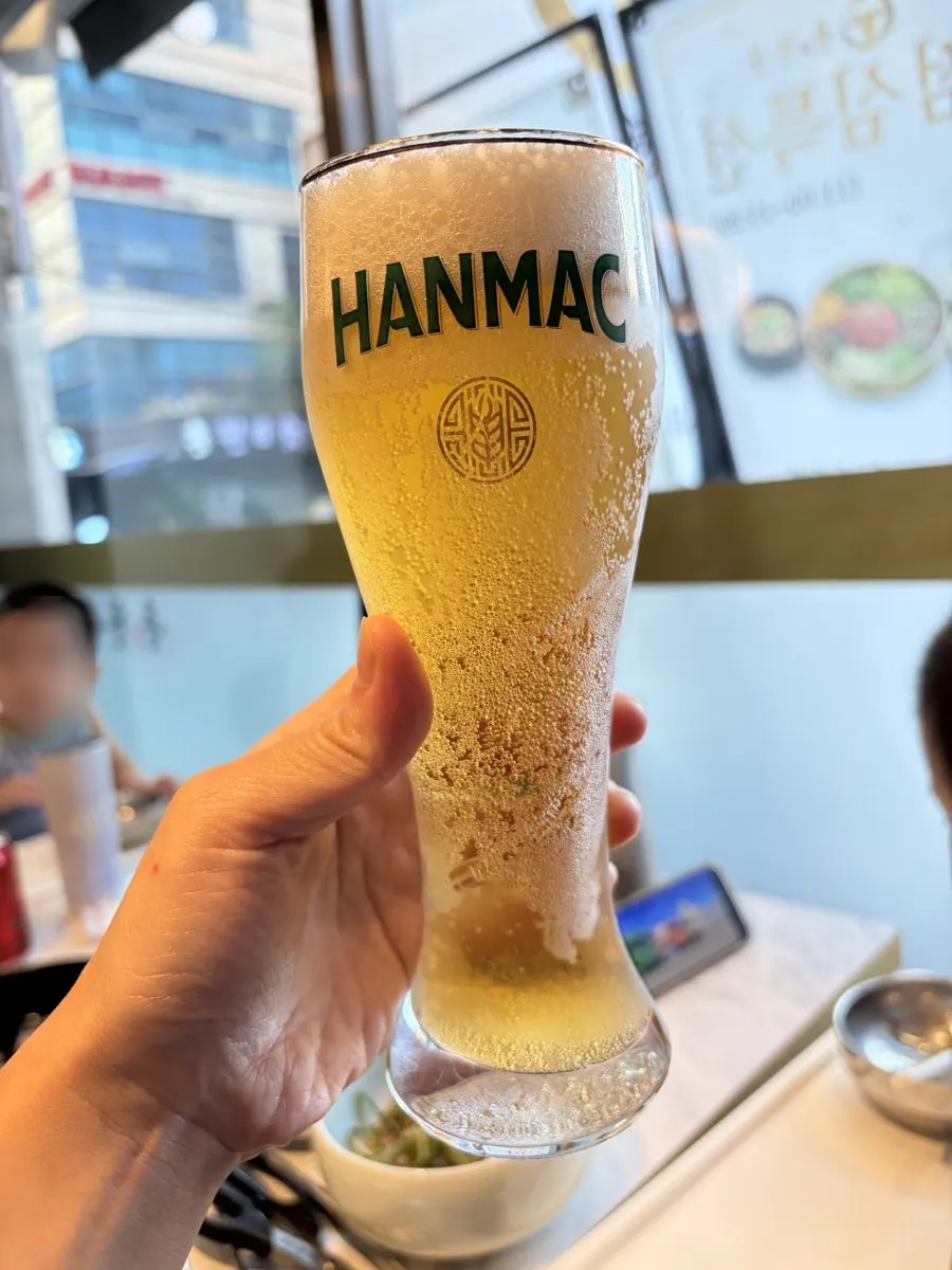 A glass of draft beer at the BBQ table