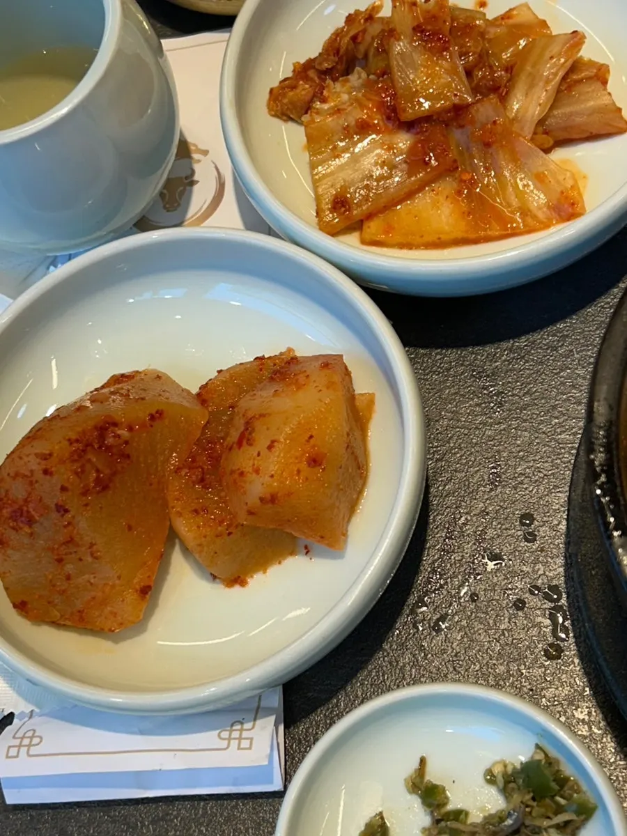 Kimchi and diced radish kimchi served with the doenjang stew