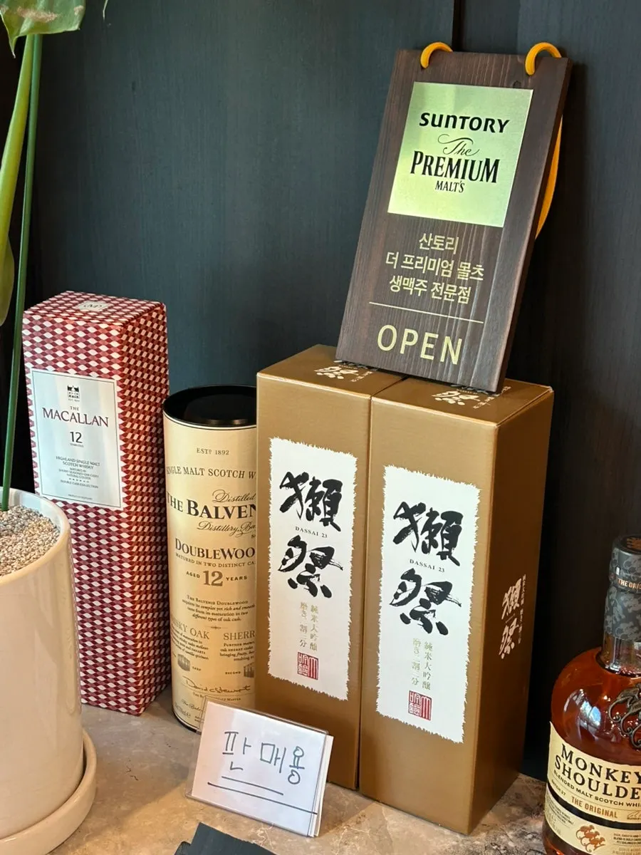 Whiskey and sake display case in a corner of the restaurant