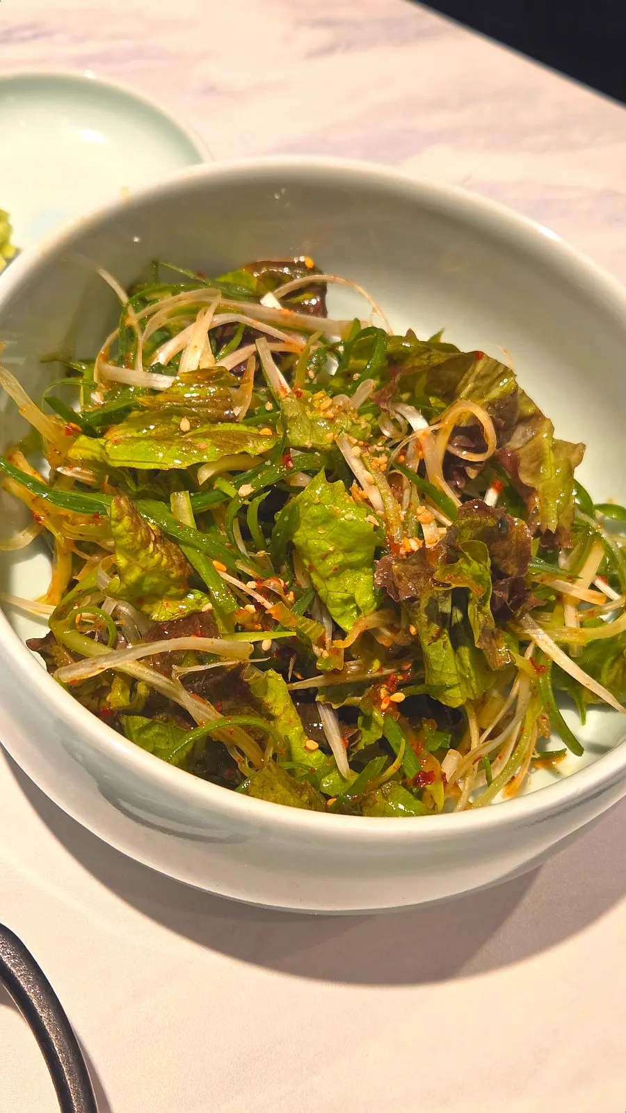 Thinly shredded fresh lettuce salad
