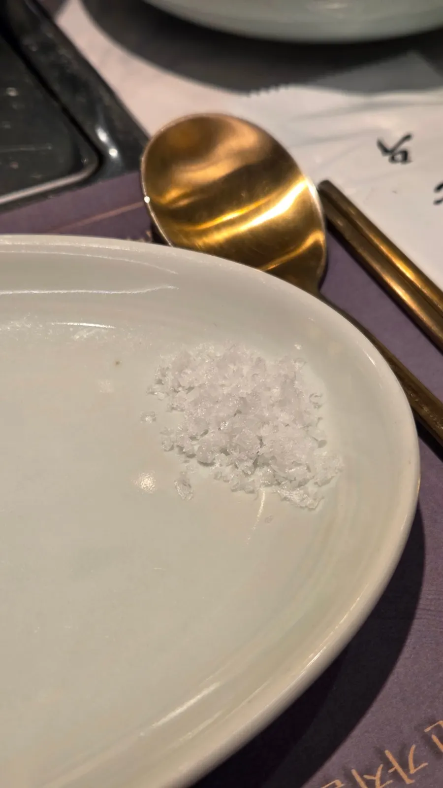 Table setting with whole-grain mustard sauce and wasabi