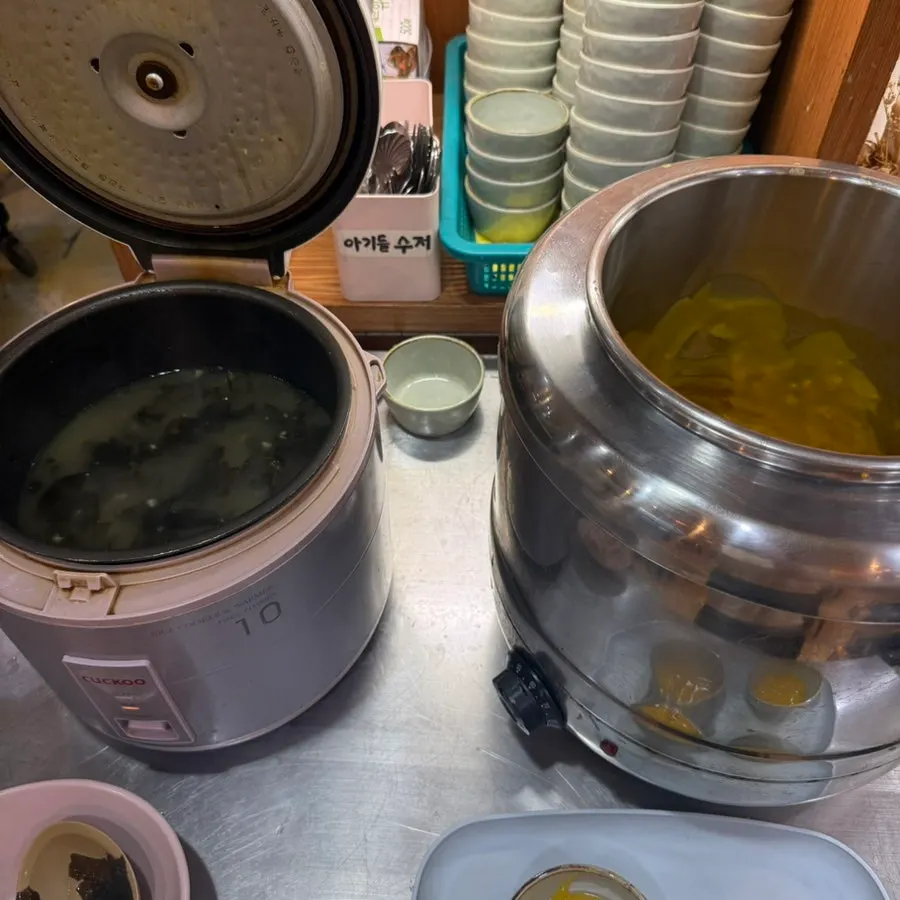 Self-serve pumpkin porridge station before the meal