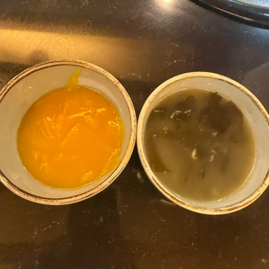 Warm seaweed soup and pumpkin porridge at the self-serve station
