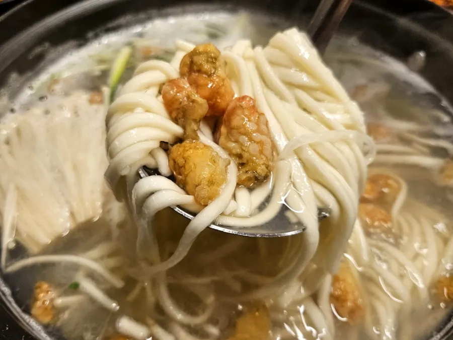 Kalguksu meal with deep, rich broth