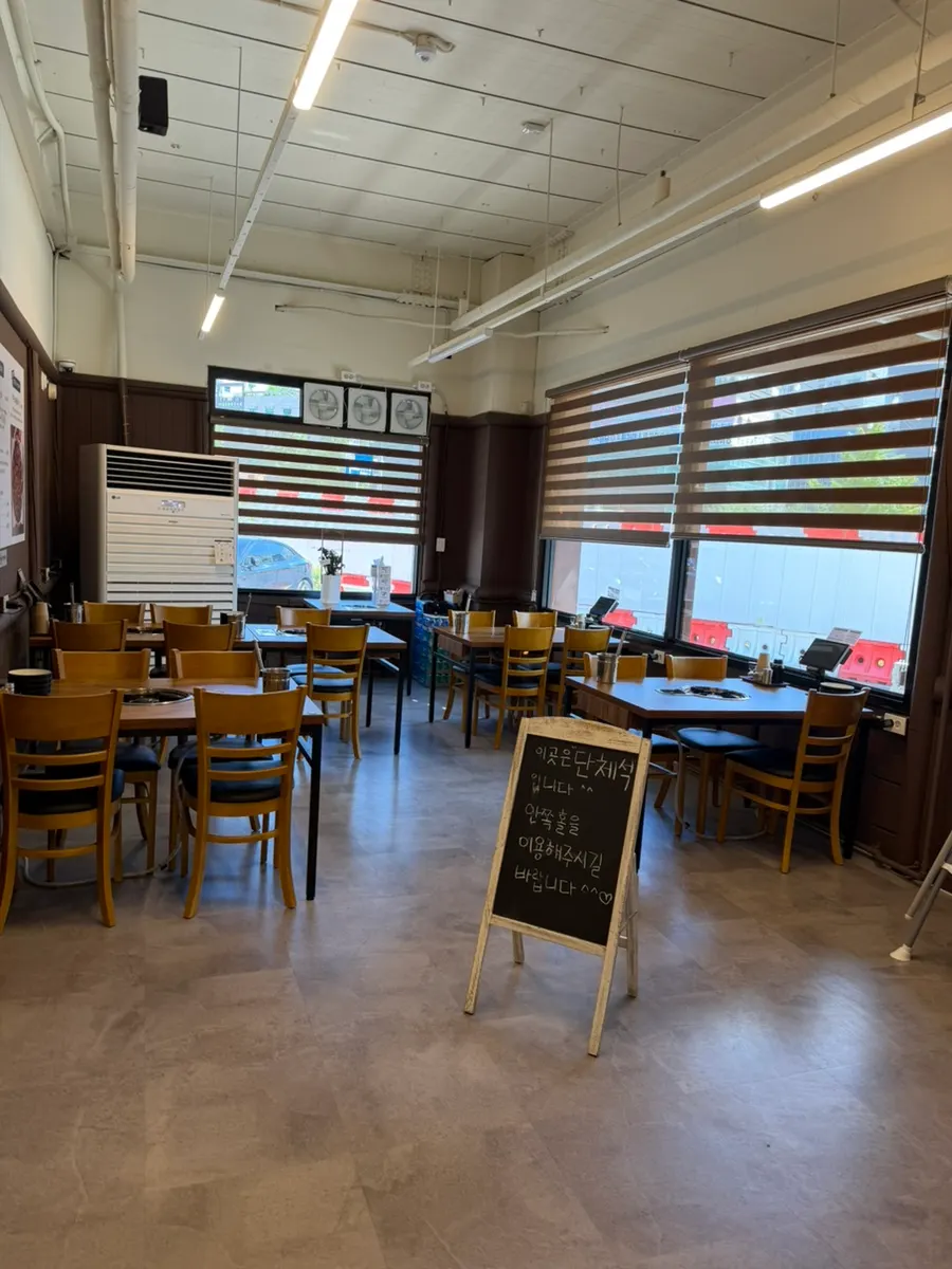 Spacious dining hall with group tables
