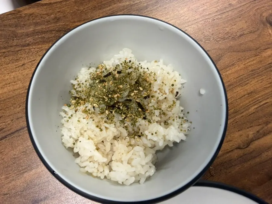 Free baby rice topped with sesame oil and furikake