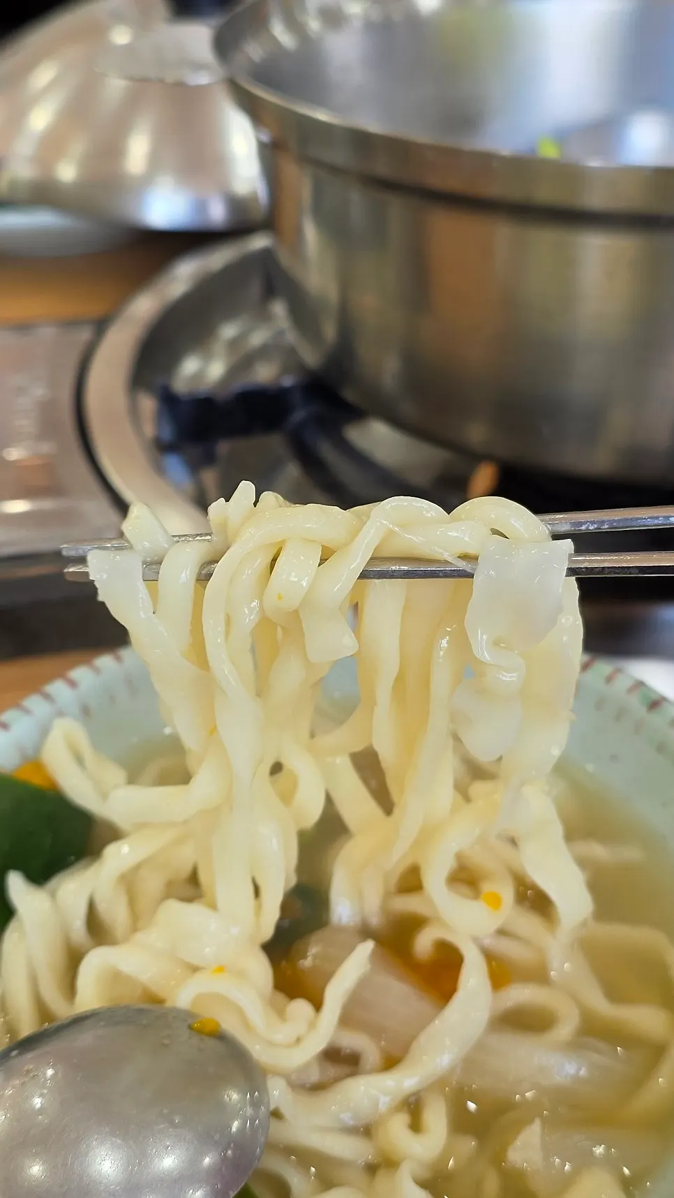 Barley rice and seafood kalguksu meal spread
