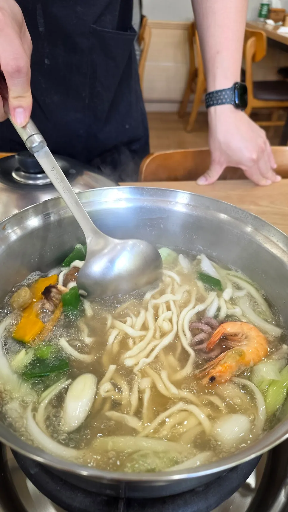 A hot bowl of seafood kalguksu