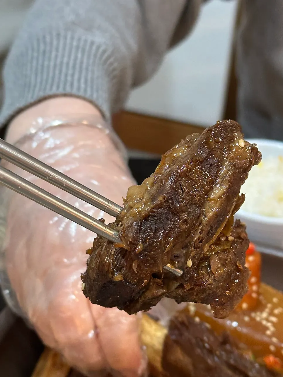 Braised beef short rib separating from the bone