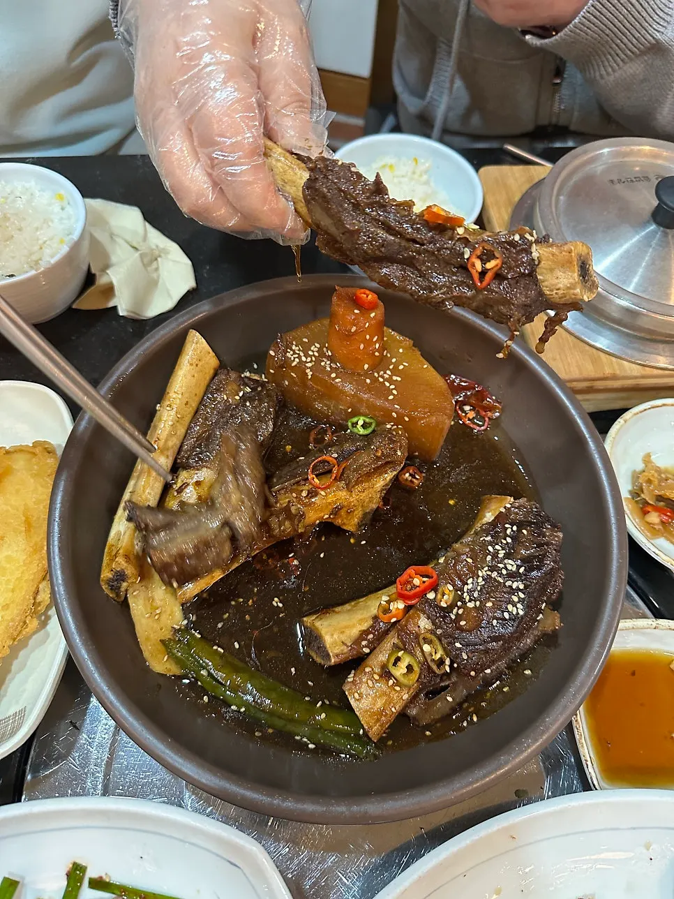 Braised beef short ribs prepared into bite-sized pieces