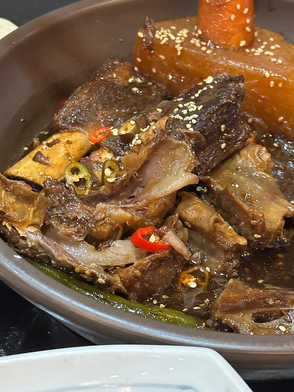 Braised beef short ribs prepared into bite-sized pieces