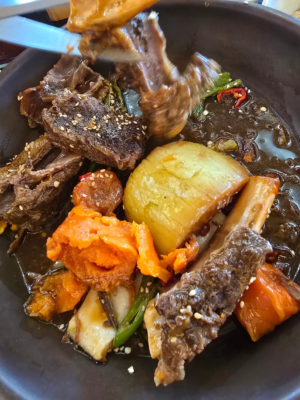 Braised beef short ribs with meat picked from the bone