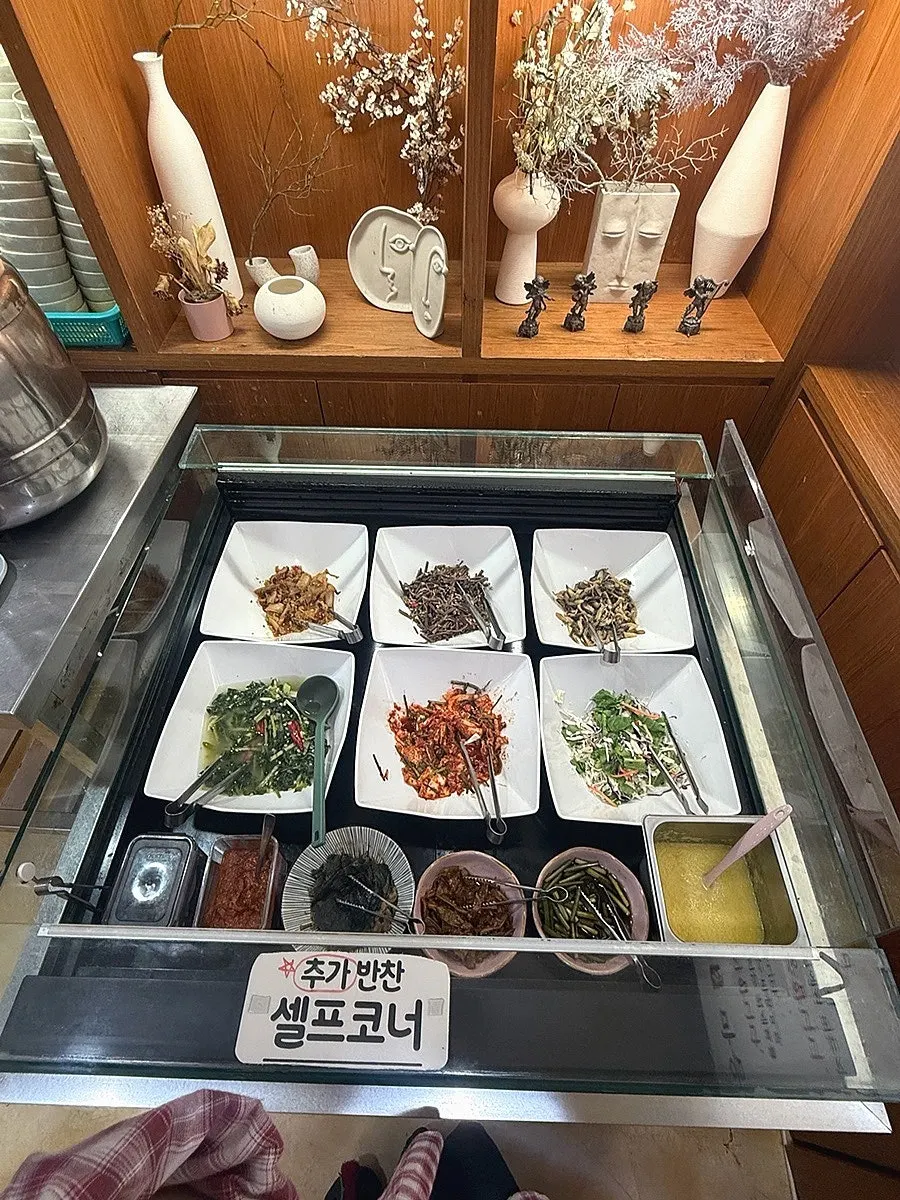 Sotbap Hansang's meal spread with a variety of side dishes
