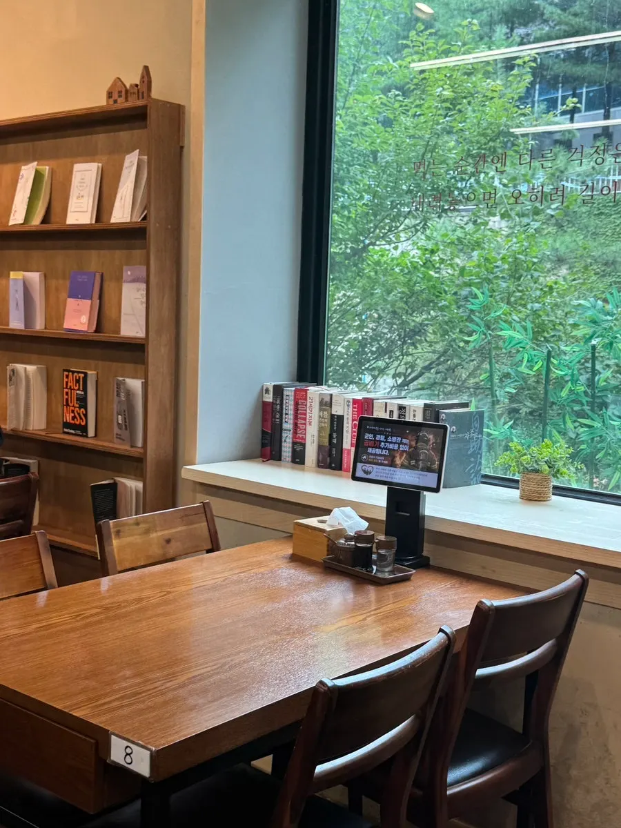 Books and seating inside the restaurant