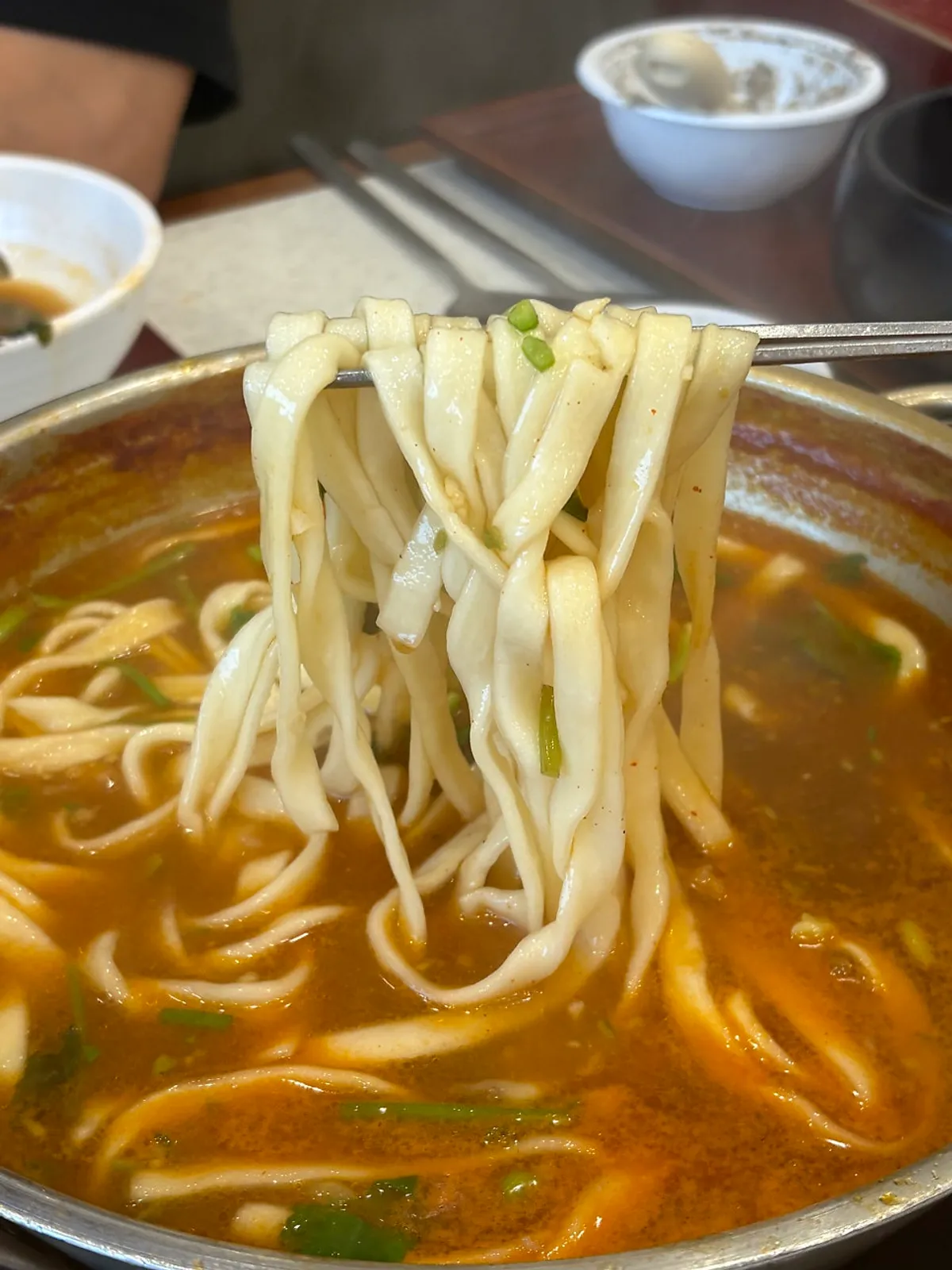 A full spread of chadol minari-wrap shabu kalguksu at Jangwongap Kalguksu Yongin Giheung Branch
