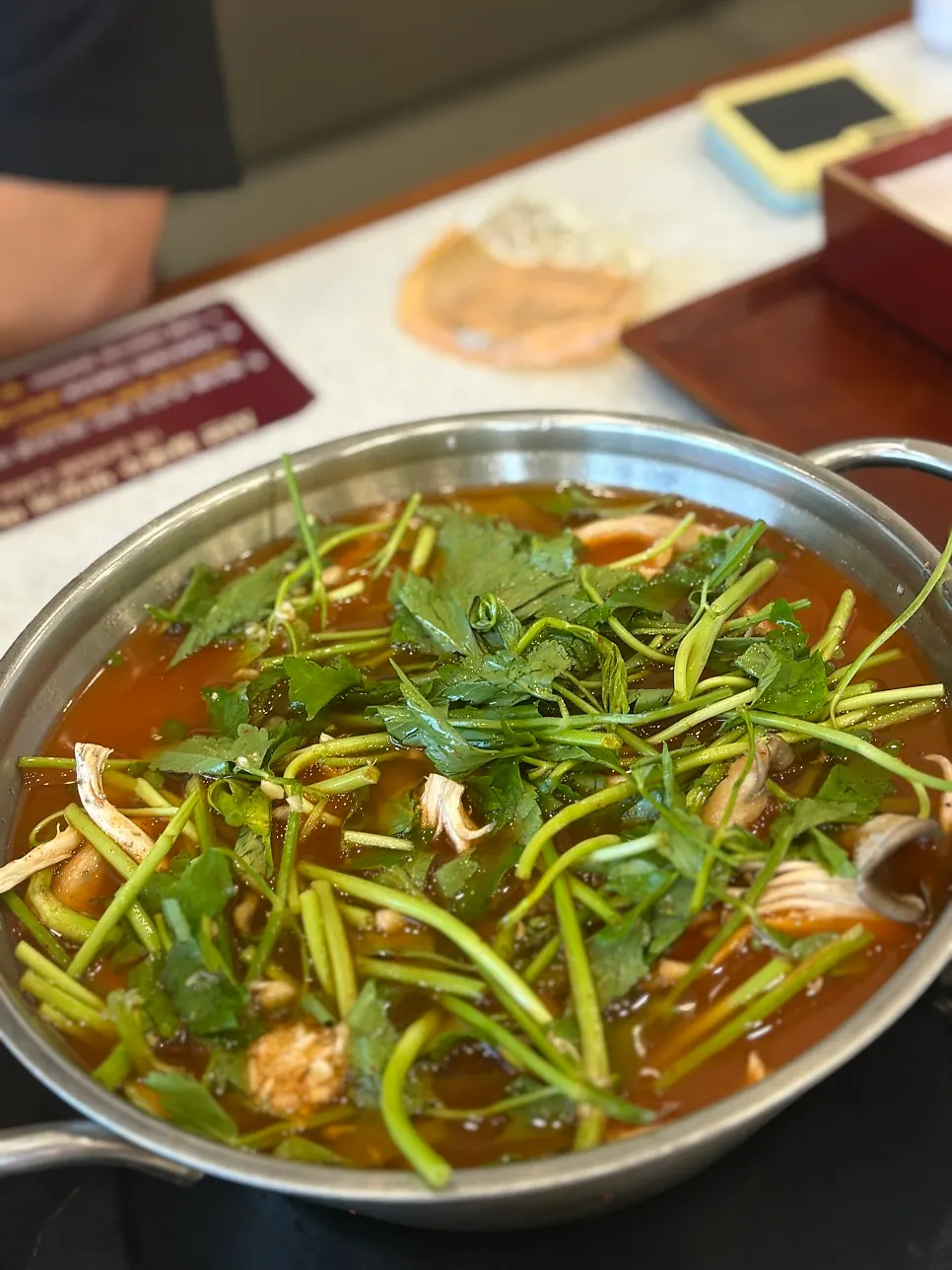 Uiseong garlic kimchi and raw kalguksu noodles on a tray
