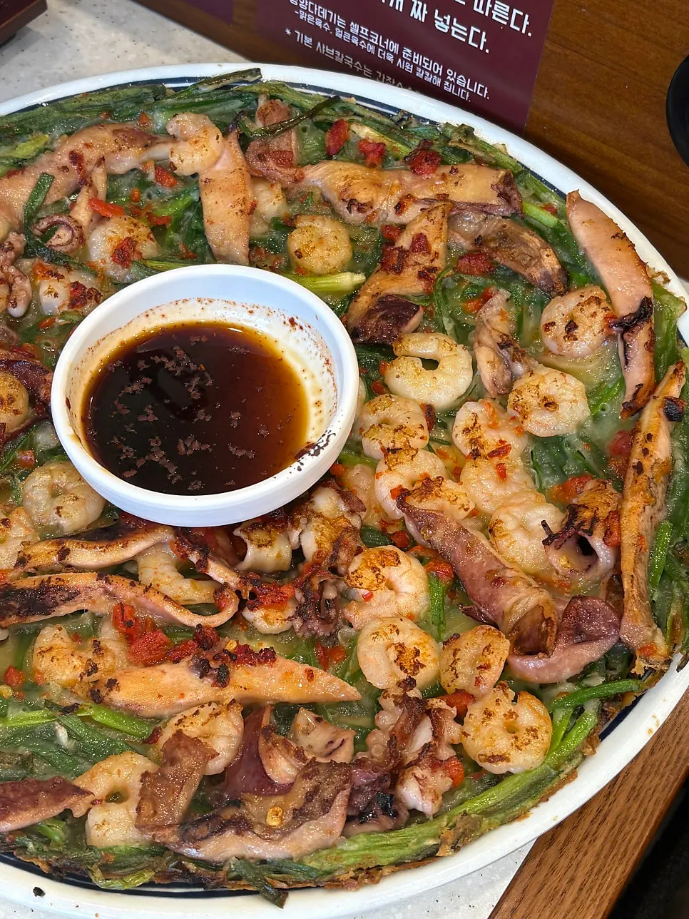 Cross-section of the pancake packed with shrimp and squid