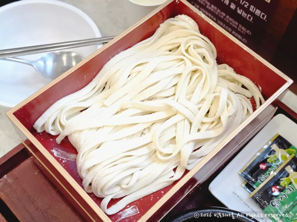 House-made kalguksu noodles before going into the shabu broth