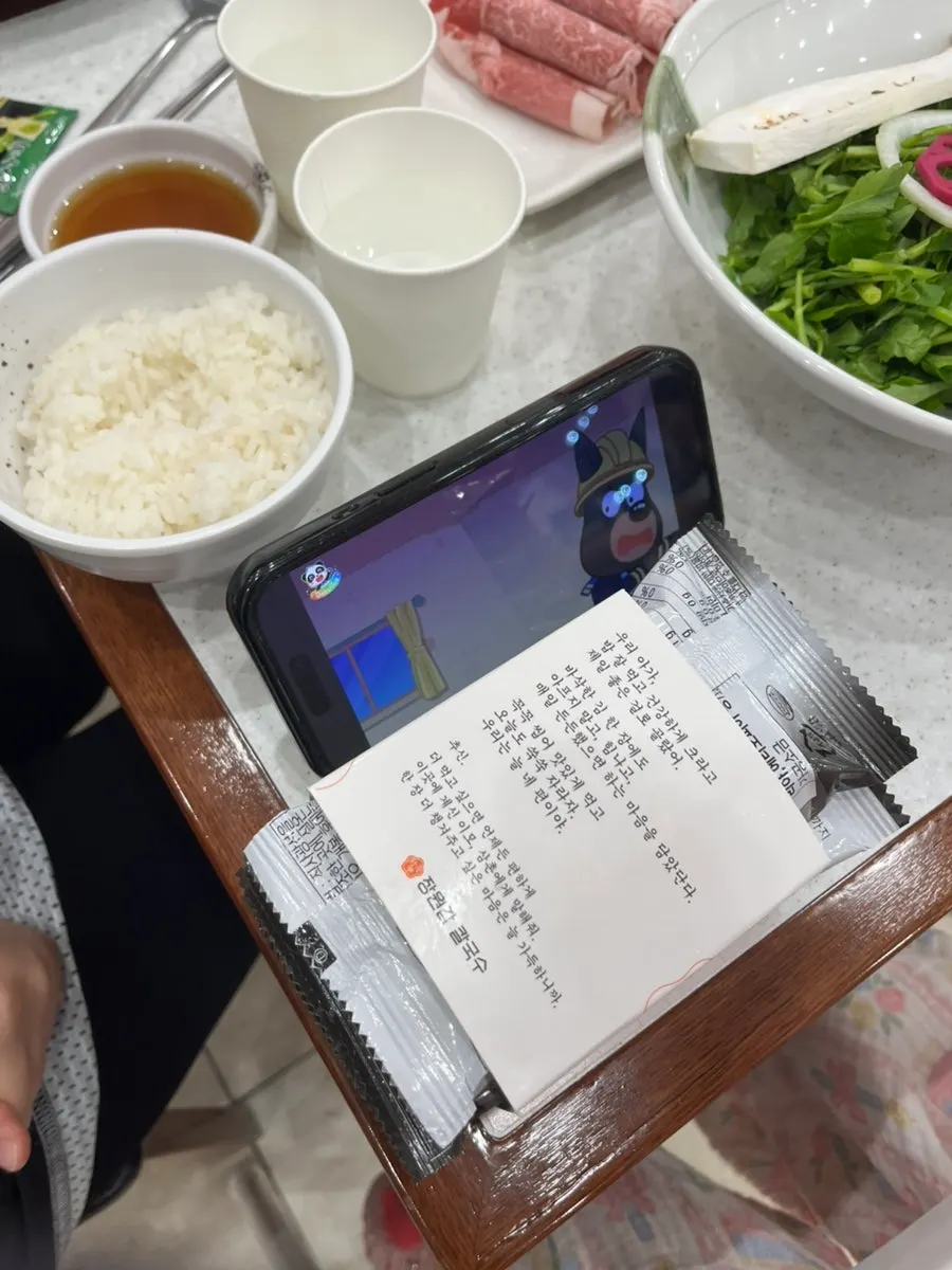 Interior of Jangwongap Kalguksu with generously spaced tables