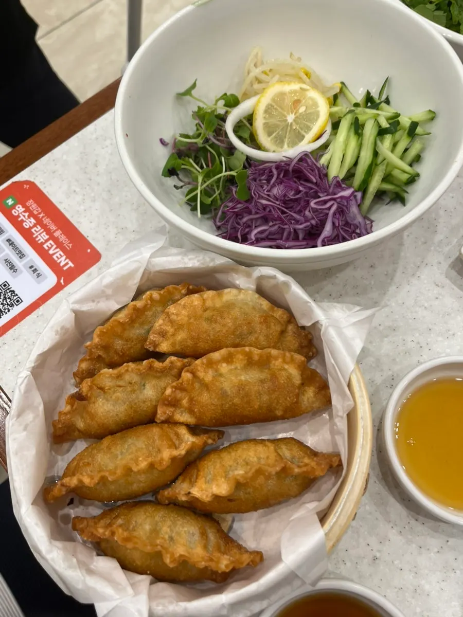 A plate of Jochiwon Peach Bibim Mandu