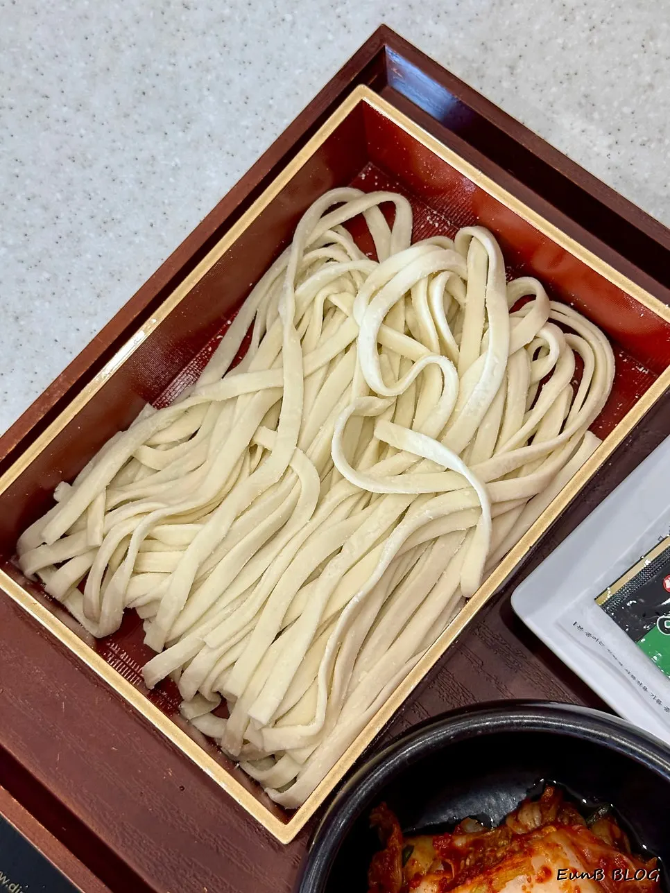 Wagyu brisket dipped in sesame oil sauce