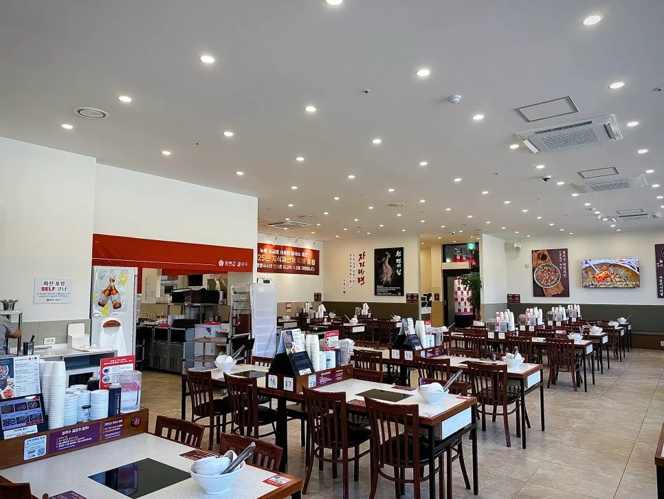 Wide parking lot and first-floor exterior of the restaurant