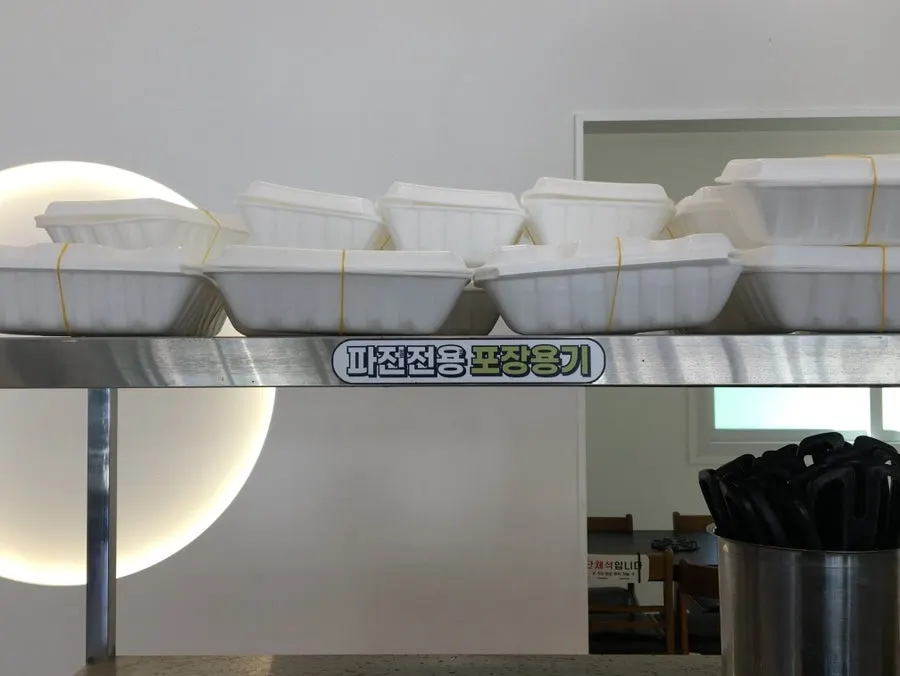 Takeout containers for pancake at the self-service bar