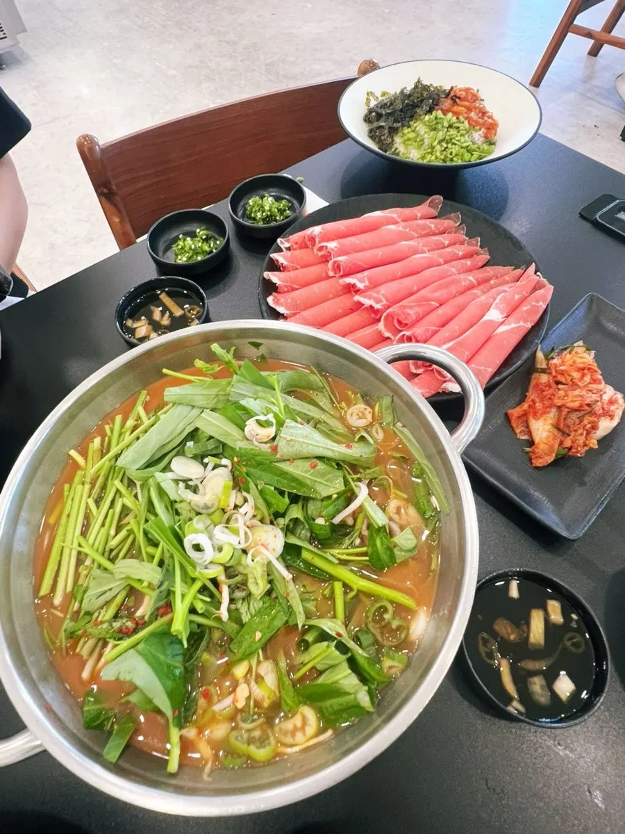 Full spread of spicy shabu-kalguksu for three
