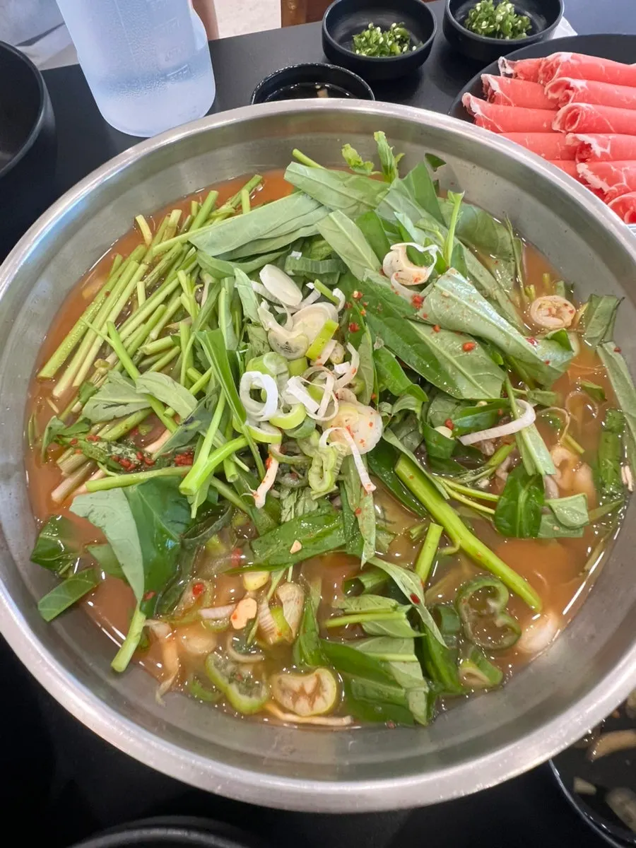 Plate of minari and kong-simchae (water spinach)