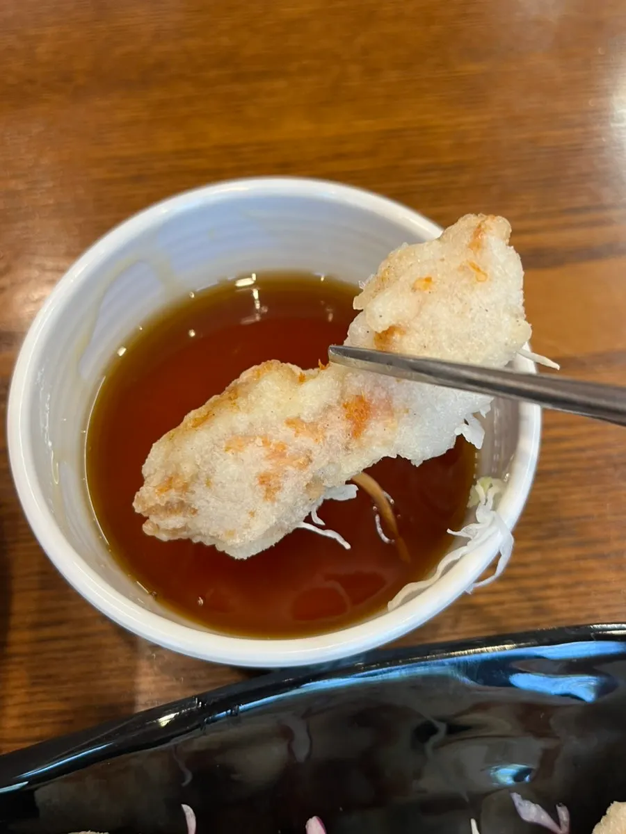 Cross-section of sweet and sour pork meat and sauce
