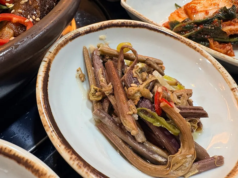 Full spread of side dishes at Sotbap Hansang