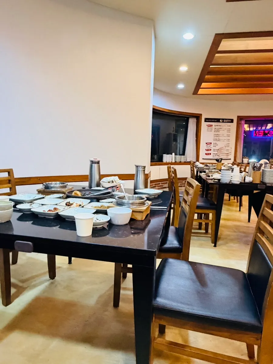 Choosing a menu at a table at Sotbap Hansang