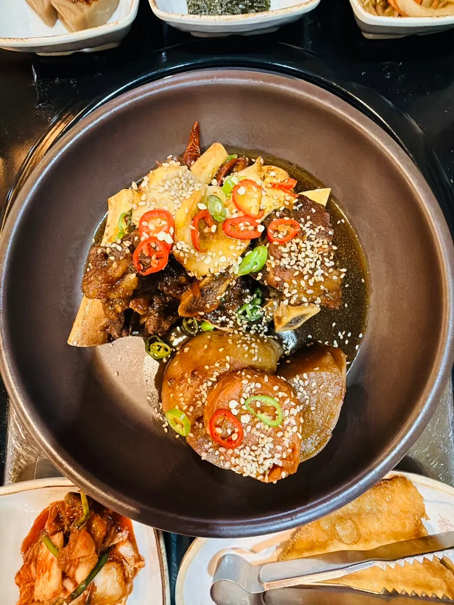 Braised short rib with a large rib bone