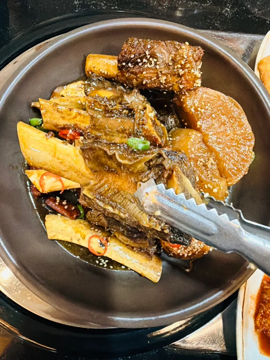 A piece of seasoned braised short rib