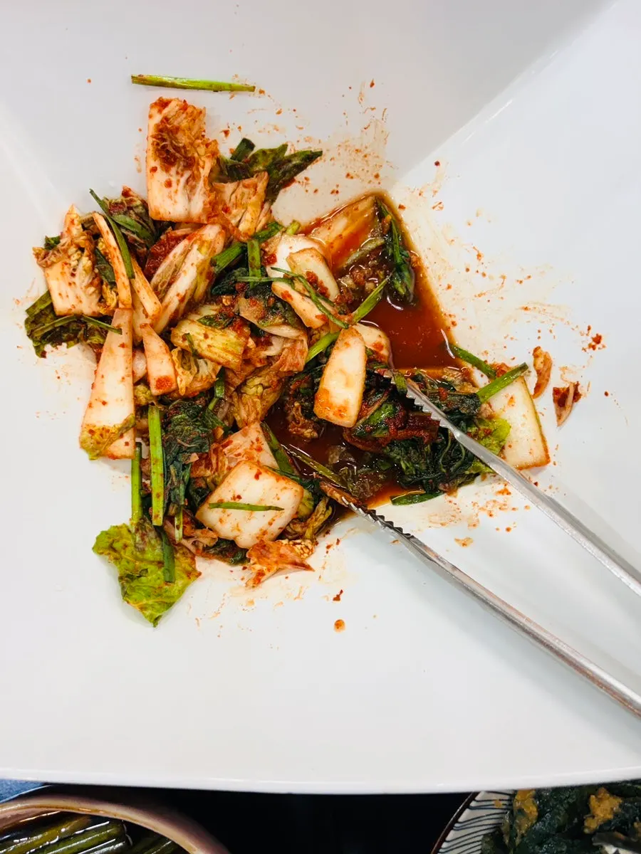 Self-serve bar with namul and young radish water kimchi
