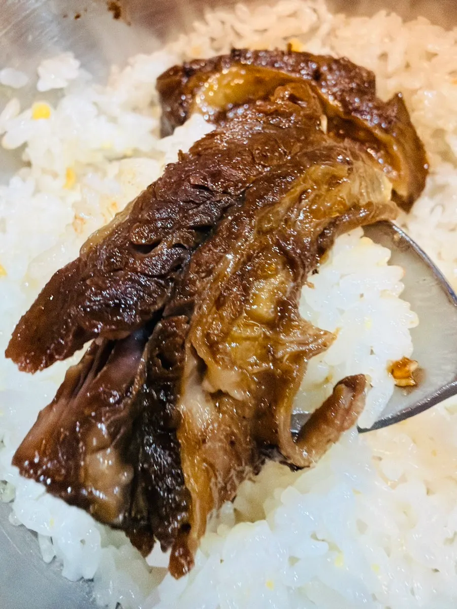 Complete set meal with pot rice, braised short rib, and soup