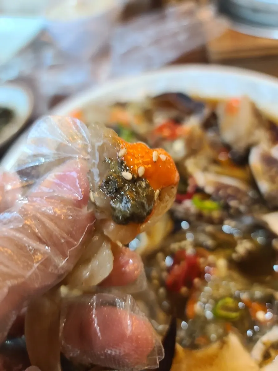 Crab meat and roe piled on rice