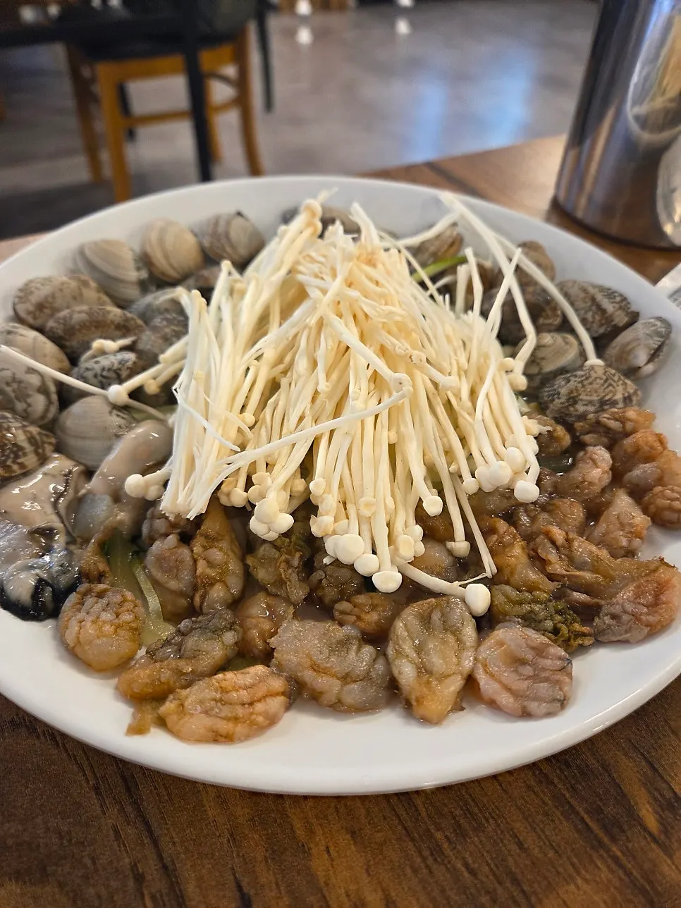 Seafood kalguksu with clams, oysters, and sea squirts