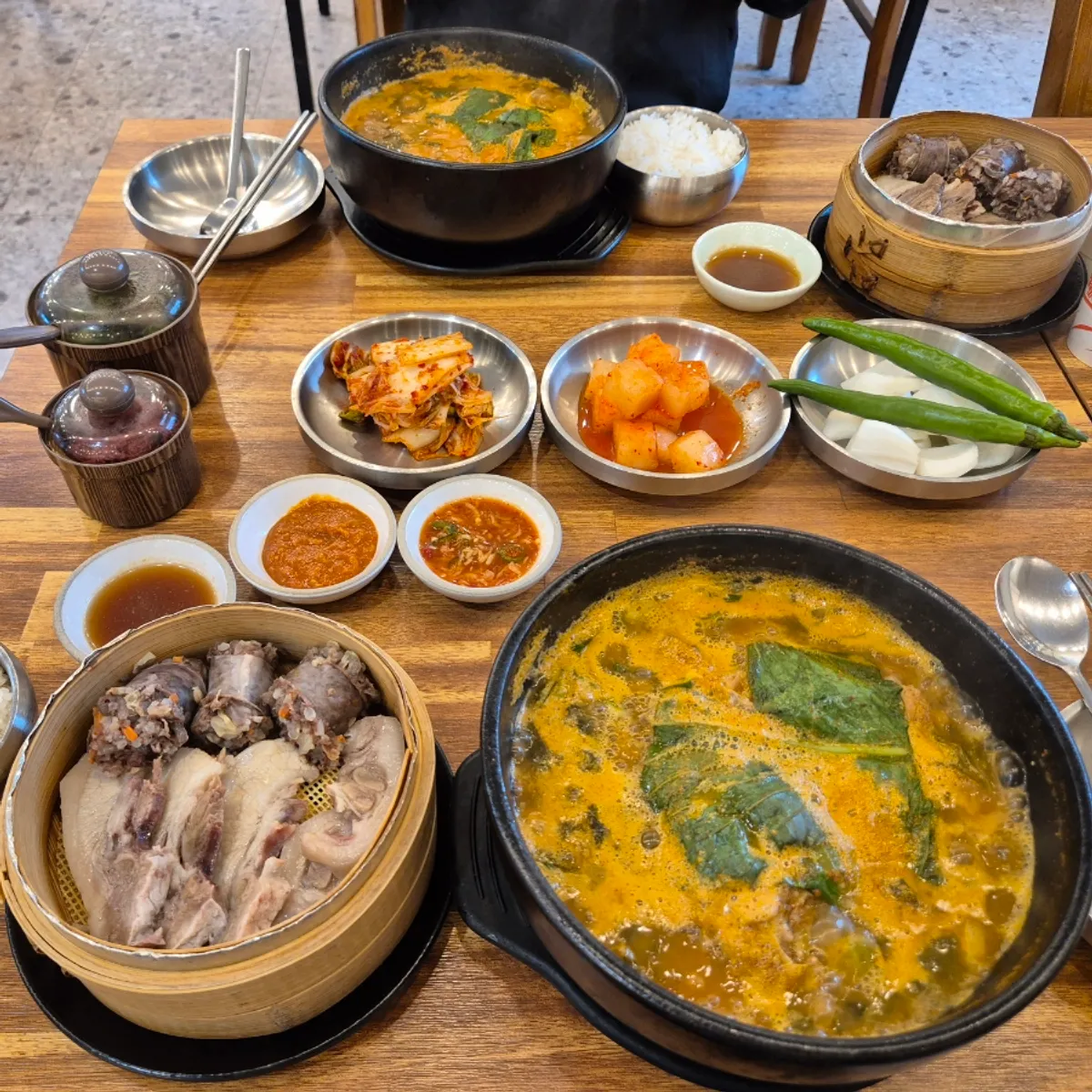 Full spread of the pork bone soup set meal