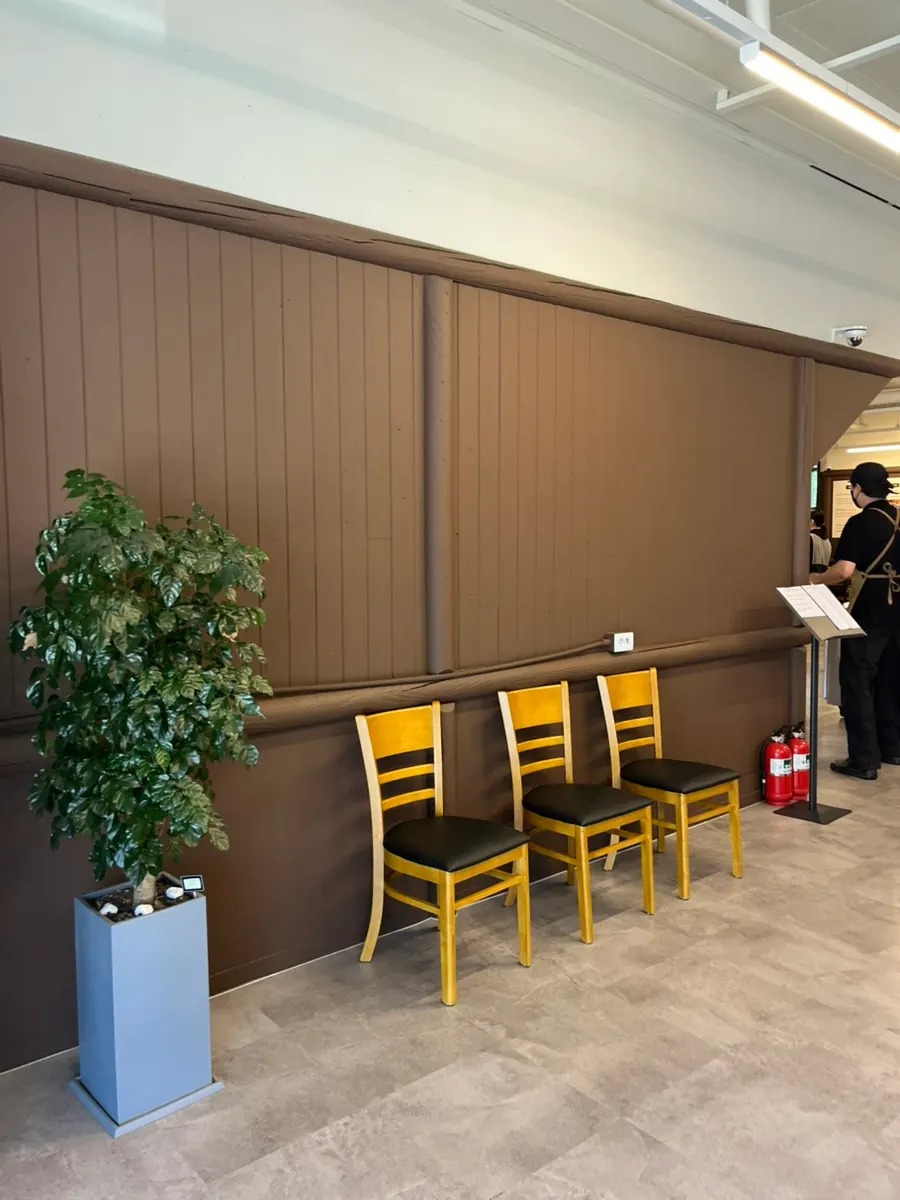Self-serve corner near the entrance with old-style snacks and a coffee machine