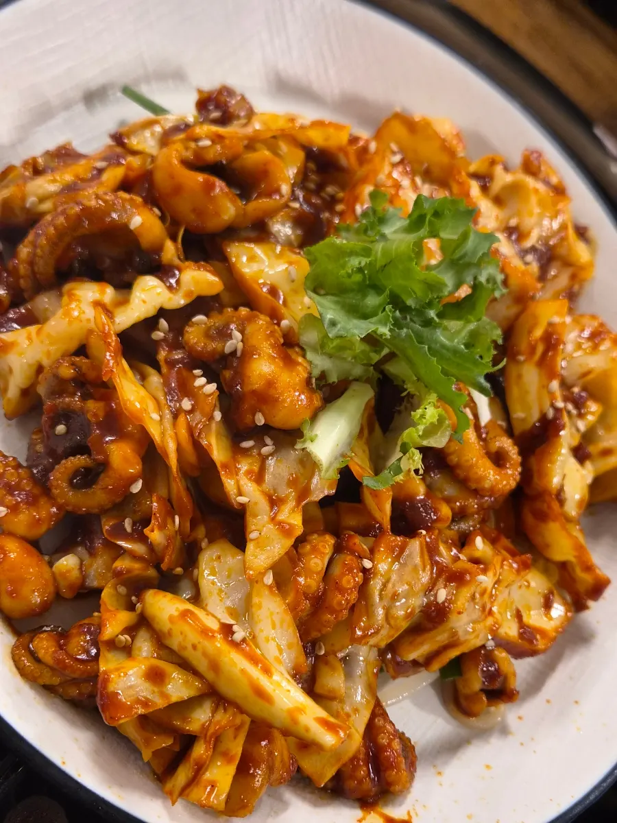 Crisp kimchi served alongside the kalguksu
