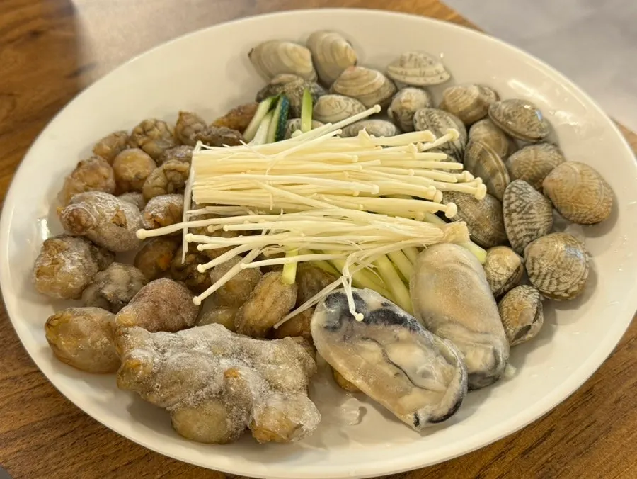 Basic side dishes: tangy radish salad and sweet fresh kimchi