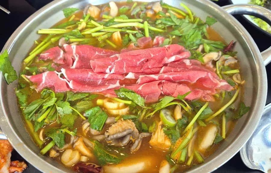 Shabu-shabu meat added to the broth