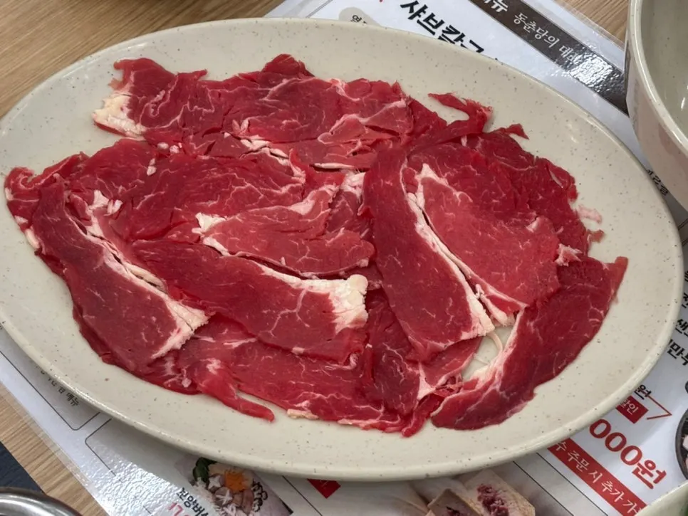 Generous shabu-kalguksu with meat and vegetables