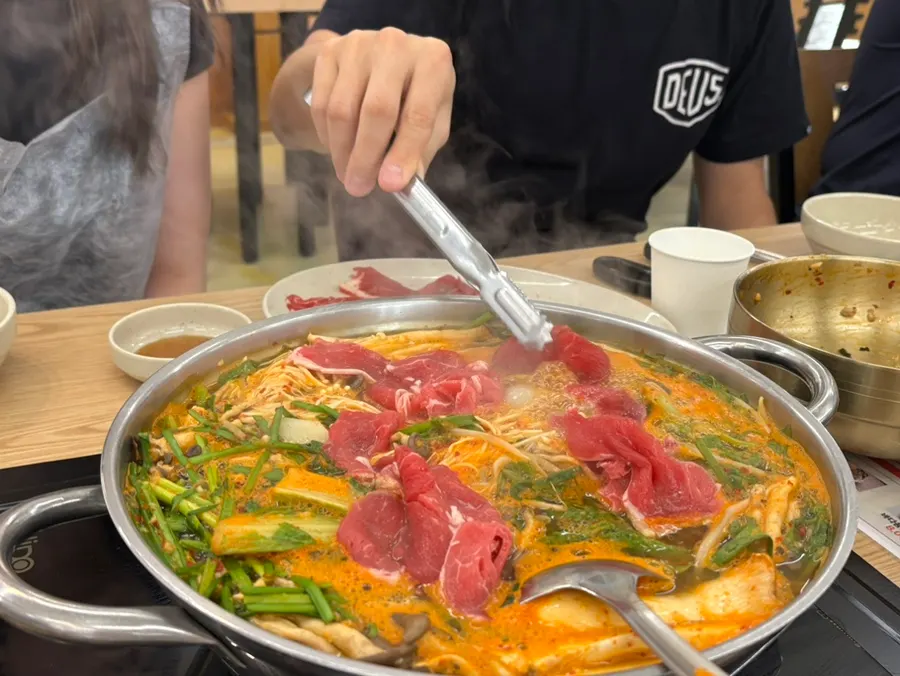 Mild shabu-kalguksu with tofu topping