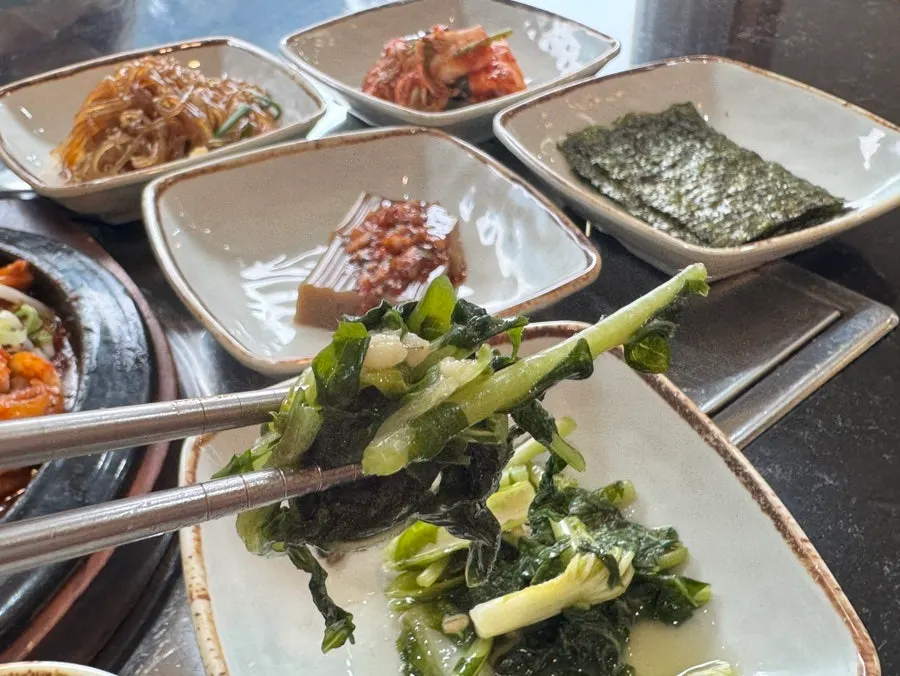 Neatly arranged side dishes at Sotbap Hansang